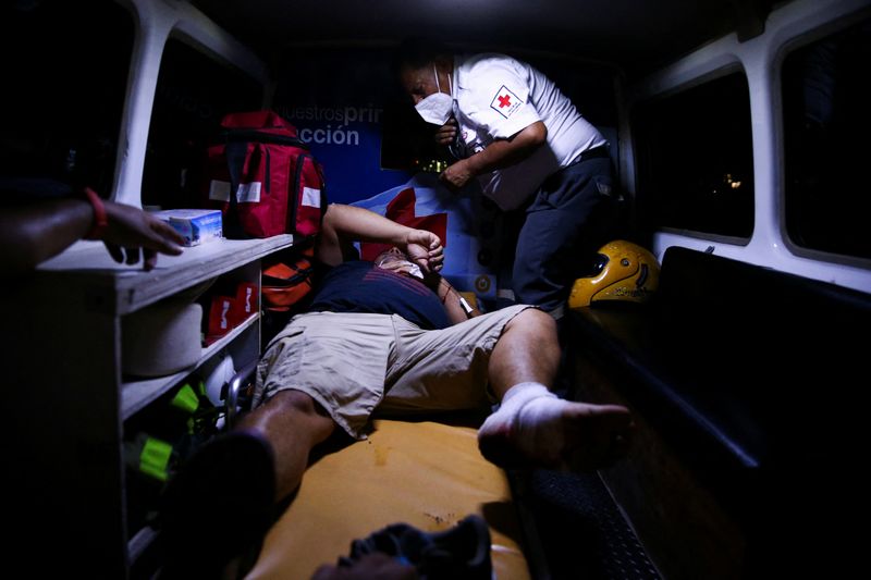 &copy; Reuters. A fan is attended to in an ambulance following a stampede prior to a soccer game between C.D. FAS Vs. Alianza F.C. at the Cuzcatlan stadium, in San Salvador, El Salvador May 20, 2023. REUTERS/ Jose Cabezas