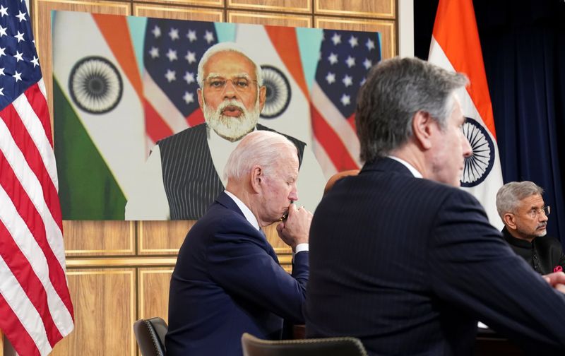 &copy; Reuters. FILE PHOTO: U.S. President Joe Biden, seated with U.S. Secretary of State Antony Blinken and India's Foreign Minister Subrahmanyam Jaishankar, holds a videoconference with India's Prime Minister Narendra Modi to discuss Russia's war with Ukraine from the 