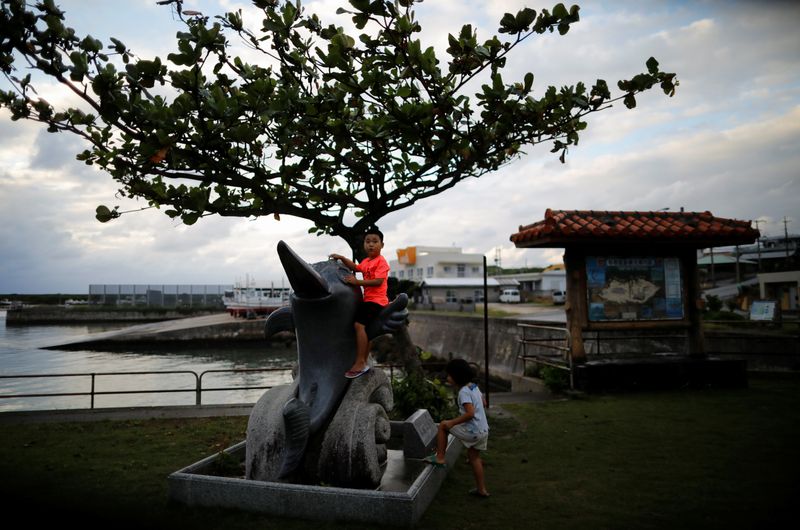 &copy; Reuters. Local children play on Japan's westernmost inhabited Yonaguni Island in Yonaguni, Okinawa prefecture, Japan, October 26, 2021. Picture taken October 26, 2021.  REUTERS/Issei Kato/File Photo