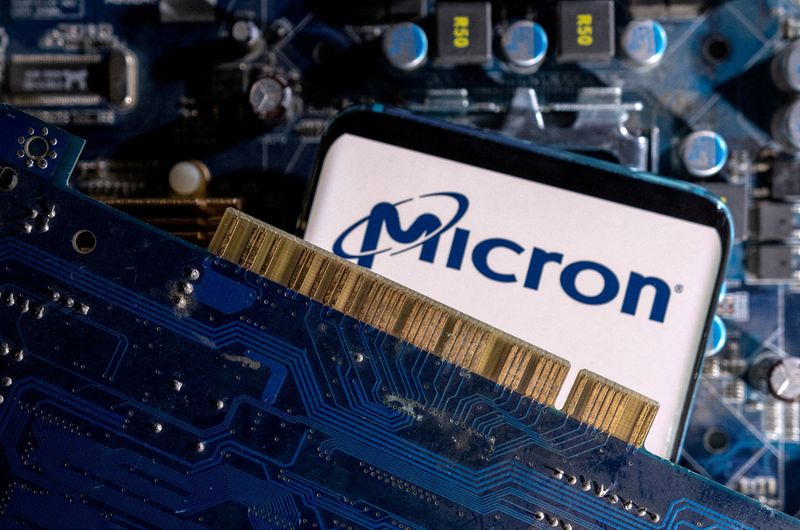 &copy; Reuters. FILE PHOTO: A smartphone with a displayed Micron logo is placed on a computer motherboard in this illustration taken March 6, 2023. REUTERS/Dado Ruvic/Illustration