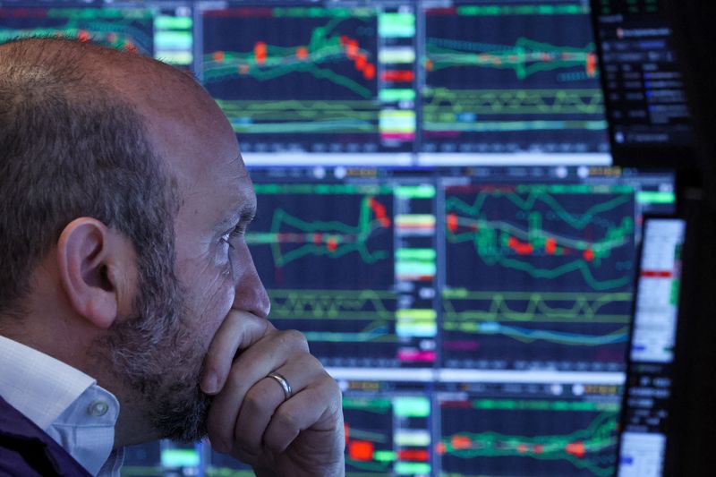 &copy; Reuters. FILE PHOTO: A trader works on the floor of the New York Stock Exchange (NYSE) in New York City, U.S., May 22, 2023.  REUTERS/Brendan McDermid