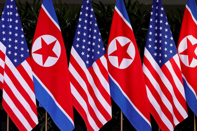 &copy; Reuters. FILE PHOTO: U.S. and North Korean national flags are seen at the Capella Hotel on Sentosa island in Singapore June 12, 2018. REUTERS/Jonathan Ernst/File Photo