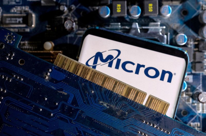 &copy; Reuters. FILE PHOTO: A smartphone with a displayed Micron logo is placed on a computer motherboard in this illustration taken March 6, 2023. REUTERS/Dado Ruvic/Illustration/