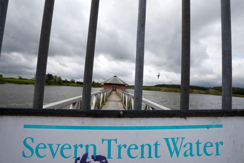 &copy; Reuters. FILE PHOTO: A Severn Trent sign hangs on a gate at Cropston Reservoir in Cropston, central England, May 15, 2013. REUTERS/Darren Staples  