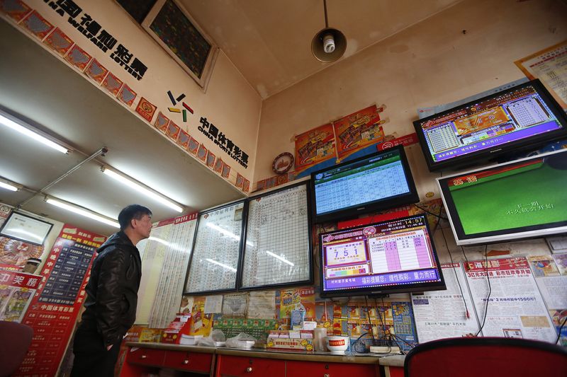 Chinese snap up lottery tickets amid economic gloom