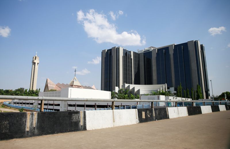 &copy; Reuters. FILE PHOTO: A view of Central Bank of Nigeria headquaters next to National Ecumenical Centre in Abuja, Nigeria November 23, 2021. REUTERS/Afolabi Sotunde