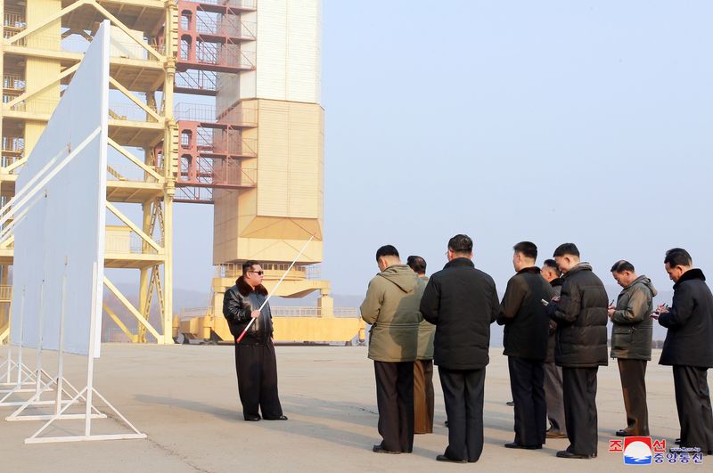 &copy; Reuters. FILE PHOTO: North Korean leader Kim Jong Un gives field guidance at the Seohae satellite launch site, in North Korea, in this photo released on March 11, 2022 by North Korea's Korean Central News Agency (KCNA). KCNA via REUTERS 