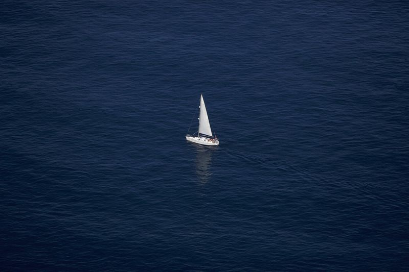 &copy; Reuters. FILE PHOTO: A sailboat is pictured sailing in the Mediterranean sea, from the Rock, in the British overseas territory of Gibraltar, south of Spain August 16, 2013. Picture taken August 16, 2013. REUTERS/Jon Nazca
