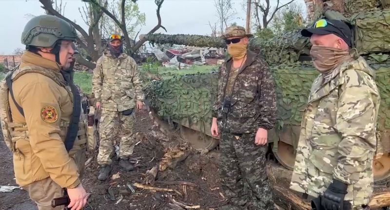 &copy; Reuters. Founder of Wagner private mercenary group Yevgeny Prigozhin talks to Wagner fighters in the course of Russia-Ukraine conflict in Bakhmut, Ukraine, in this still image taken from video released May 25, 2023. Press service of "Concord"/Handout via REUTERS 