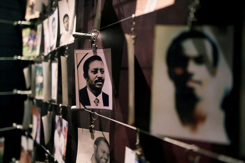 &copy; Reuters. FILE PHOTO: Pictures of the Rwandan Genocide victims donated by survivors are displayed at an exhibition at the Genocide Memorial in Gisozi in Kigali, Rwanda April 6, 2019.REUTERS/Baz Ratner/File Photo