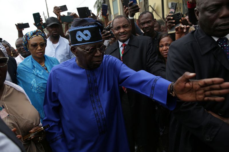 &copy; Reuters. FILE PHOTO: Presidential candidate Bola Ahmed Tinubu arrives at a polling station before casting his ballot in Ikeja, Lagos, Nigeria February 25, 2023 REUTERS/James Oatway