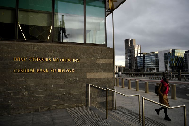 &copy; Reuters. A woman walks past the Central Bank of Ireland in Dublin, Ireland, February 11, 2022. REUTERS/Clodagh Kilcoyne