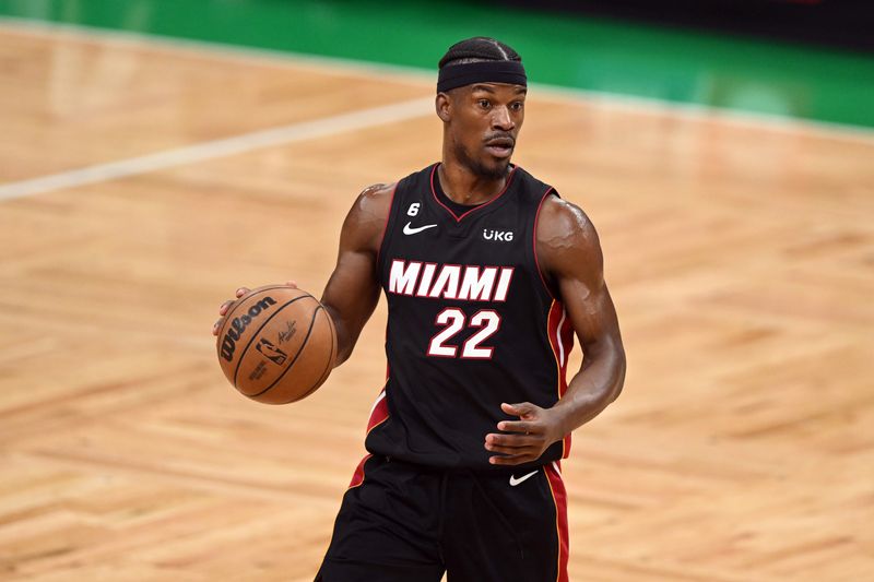 &copy; Reuters. FILE PHOTO:  May 25, 2023; Boston, Massachusetts, USA; Miami Heat forward Jimmy Butler (22) controls the ball in the third quarter against the Boston Celtics during game five of the Eastern Conference Finals for the 2023 NBA playoffs at TD Garden. Mandato