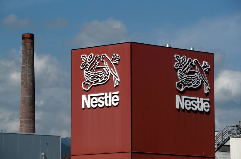 &copy; Reuters. FILE PHOTO: A Nestle logo is pictured on a coffee factory in Orbe, Switzerland May 31, 2018. REUTERS/Denis Balibouse