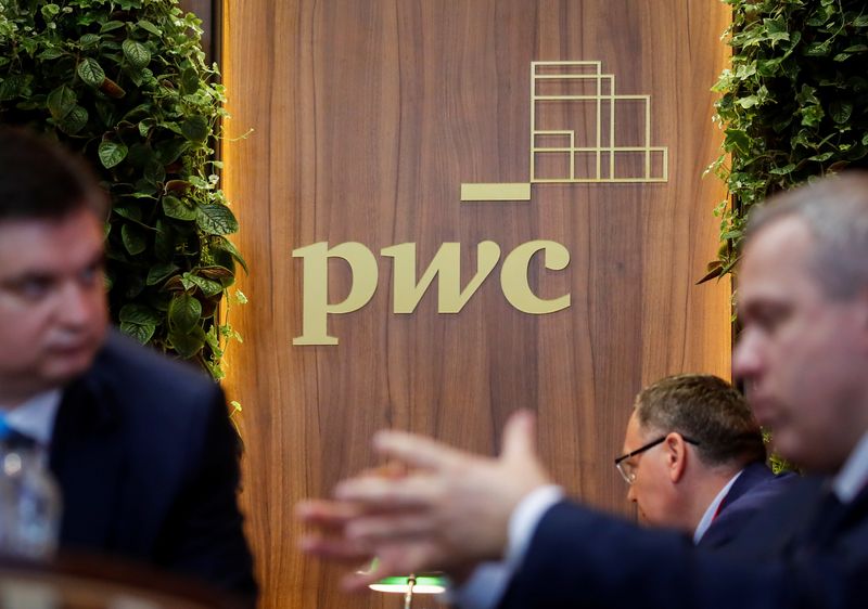 &copy; Reuters. FILE PHOTO: The logo of of accounting firm PricewaterhouseCoopers (PwC) is seen on a board at the St. Petersburg International Economic Forum (SPIEF), Russia, June 6, 2019. REUTERS/Maxim Shemetov
