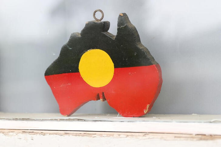 &copy; Reuters. FILE PHOTO: A depiction of the Australian Aboriginal Flag is seen on a window sill at the home of indigenous Muruwari elder Rita Wright, a member of the "Stolen Generations", in Sydney, Australia, January 19, 2021. Picture taken January 19, 2021.  REUTERS