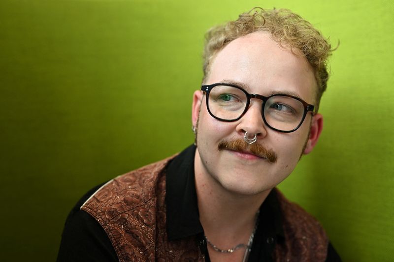 &copy; Reuters. Erik Carnell, transgender designer and artist whose products  were pulled by U.S. retailer Target from its Pride Collection amid backlash from some of their customers, poses for a portrait in London, Britain, May 30, 2023. REUTERS/Dylan Martinez