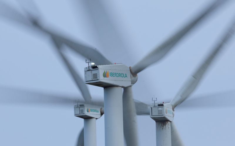 &copy; Reuters. FILE PHOTO: The logo of Spanish utilities company Iberdrola is displayed on wind turbines at Mt. Oiz, near Durango, Spain, February 20, 2023. REUTERS/Vincent West/File Photo