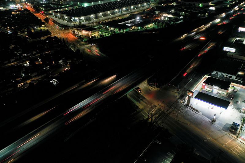 &copy; Reuters. FILE PHOTO: A nighttime view of vehicle traffic along the Interstate 405 (I-405) highway in Carson, California, U.S., March 11, 2022. Picture taken March 11, 2022.  Picture taken with a drone and long exposure. REUTERS/Bing Guan