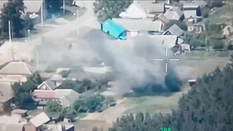 &copy; Reuters. FILE PHOTO: A still image from a drone footage released by Freedom of Russia Legion shows, what they claim, is a destruction of Russian military targets, near Novaya Tavolzhanka, Belgorod Region, Russia, in this image obtained from social media released o