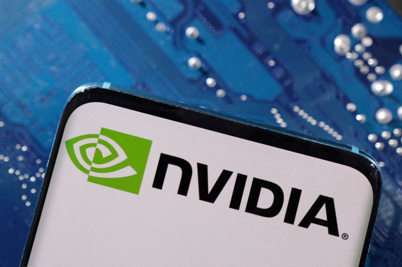 &copy; Reuters. Photo d'archives: Un smartphone avec le logo de Nvidia placé sur une carte mère d'ordinateur. /Illustration du 6 mars 2023/REUTERS/Dado Ruvic 