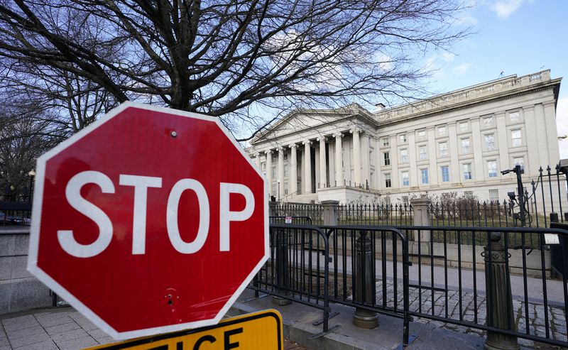 &copy; Reuters. FILE PHOTO: A view shows a stop sign at a security gate to the U.S. Treasury building in Washington, U.S., January 20, 2023.  REUTERS/Kevin Lamarque