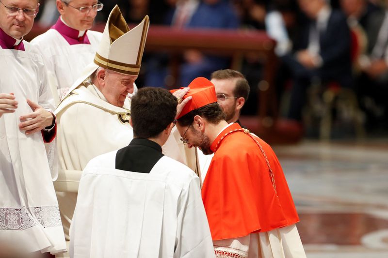 &copy; Reuters. FILE PHOTO: Pope Francis greets Giorgio Marengo during a consistory ceremony to elevate Roman Catholic prelates to the rank of cardinal, at Saint Peter's Basilica at the Vatican, August 27, 2022. REUTERS/Remo Casilli