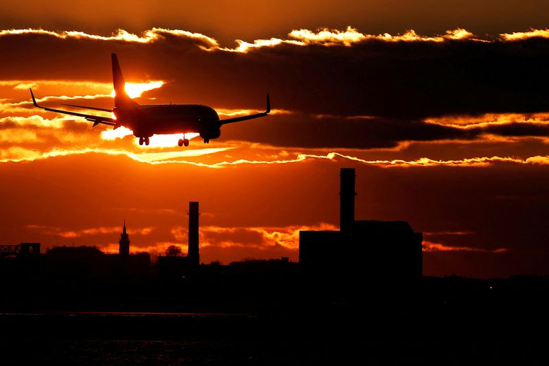 &copy; Reuters. FILE PHOTO: An American Airlines flight lands at Logan International Airport in Boston, Massachusetts, U.S. January 9, 2018. REUTERS/Brian Snyder/File Photo