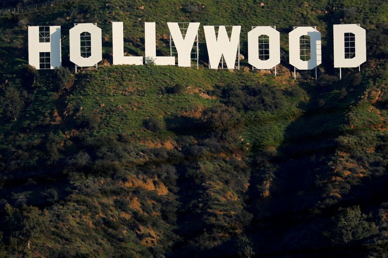 &copy; Reuters. FILE PHOTO: The iconic Hollywood sign is shown on a hillside above a neighborhood in Los Angeles California, U.S., February 1, 2019. REUTERS/Mike Blake/File Photo