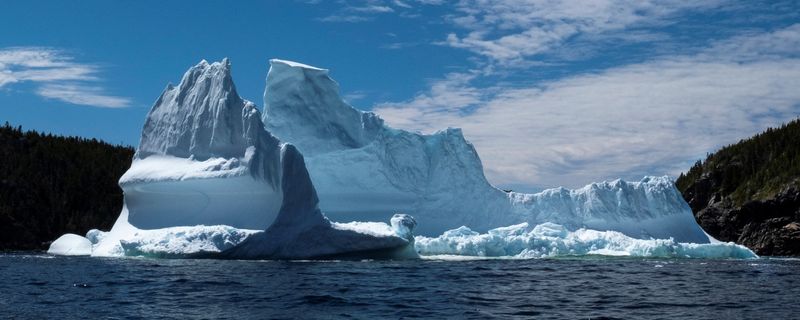 &copy; Reuters. FILE PHOTO: A large iceberg drifts off the coast of Triton, Newfoundland, Canada May 21, 2022. Picture taken May 21, 2022.  REUTERS/Greg Locke/File Photo