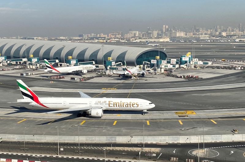 &copy; Reuters. FILE PHOTO: Emirates airliners are seen on the tarmac in a general view of Dubai International Airport in Dubai, United Arab Emirates January 13, 2021. Picture taken through a window. REUTERS/Abdel Hadi Ramahi//File Photo