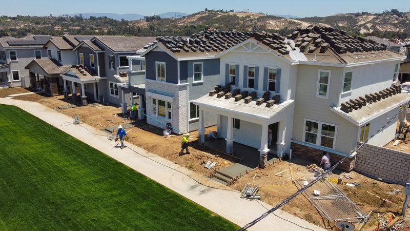 &copy; Reuters. Residential single family homes construction by KB Home are shown under construction in the community of Valley Center, California, U.S. June 3, 2021.      REUTERS/Mike Blake