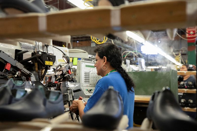 &copy; Reuters. A woman works on the interior mould of a shoe at the San Antonio Shoe Factory in Del Rio, Texas, U.S., April 3, 2023. REUTERS/Kaylee Greenlee Beal