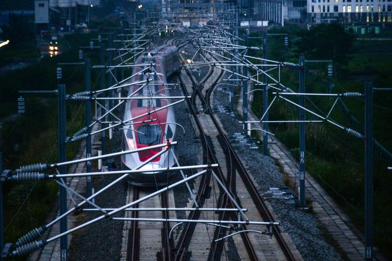 &copy; Reuters. FILE PHOTO: An electric Multiple Unit high-speed train is seen during Hot Sliding Test in Tegalluar, Bandung, West Java province, Indonesia, May 19, 2023, in this photo taken by Antara Foto. Antara Foto/Raisan Al Farisi/via REUTERS 