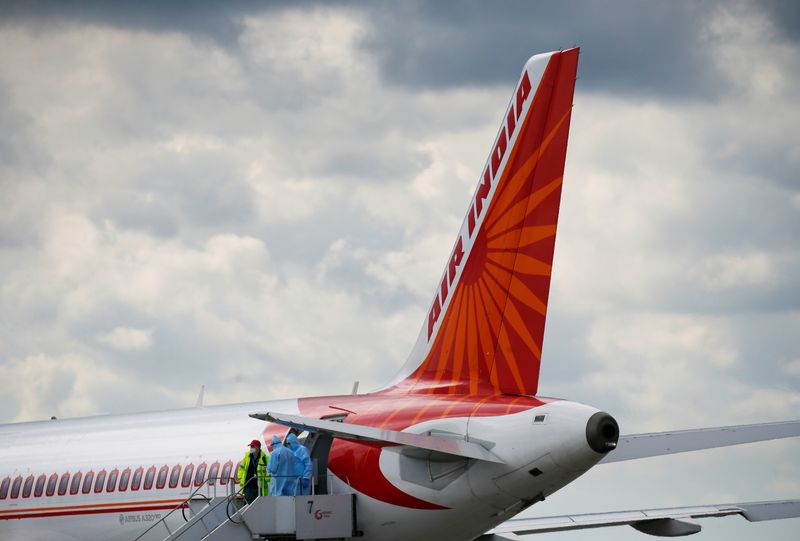 © Reuters. FILE PHOTO: An Air India Airbus A320 plane is seen at the Boryspil International Airport upon arrival, amid the coronavirus disease (COVID-19) outbreak outside Kiev, Ukraine May 26, 2020. Picture taken May 26, 2020.  REUTERS/Gleb Garanich