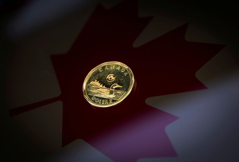 &copy; Reuters. FILE PHOTO: A Canadian dollar coin, commonly known as the "Loonie", is pictured in this illustration picture taken in Toronto January 23, 2015. The Canadian dollar strengthened against the U.S. dollar on Friday after Canadian CPI data showed an increase i