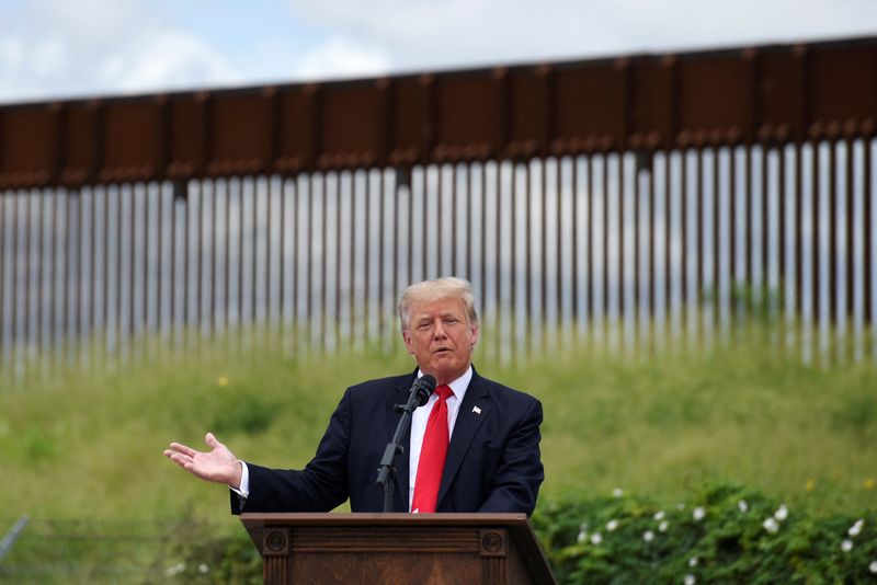 &copy; Reuters. FILE PHOTO: Former U.S. President Donald Trump visits an unfinished section of the wall along the U.S.-Mexico border in Pharr, Texas, June 30, 2021.  REUTERS/Callaghan O'Hare/File Photo