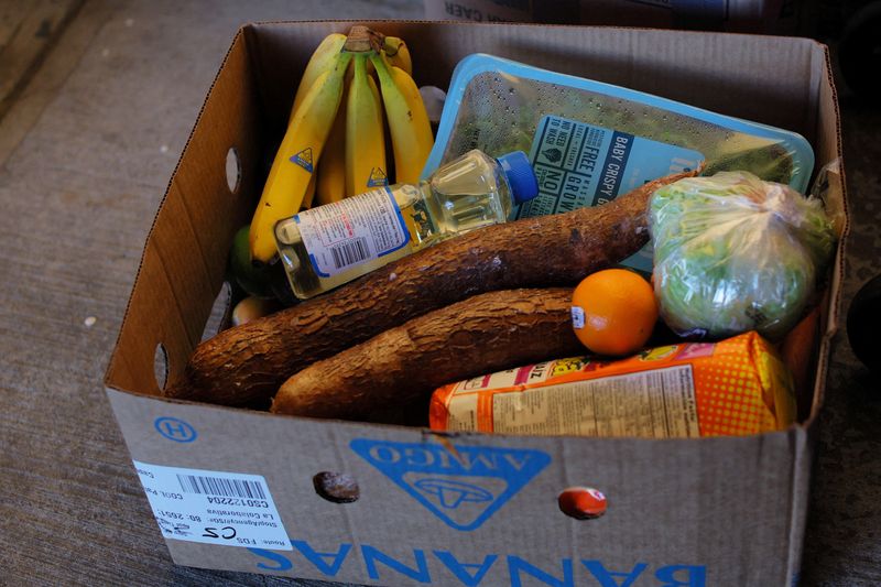 &copy; Reuters. FILE PHOTO: Food sits in a box of free groceries for residents at a food pantry run by La Colaborativa, as the U.S. is cutting benefits delivered through the Supplemental Nutrition Assistance Program (SNAP) by the end of March which kept millions from goi