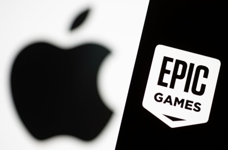 &copy; Reuters. Smartphone with Epic Games logo is seen in front of Apple logo in this illustration taken, May 2, 2021. REUTERS/Dado Ruvic/Illustration