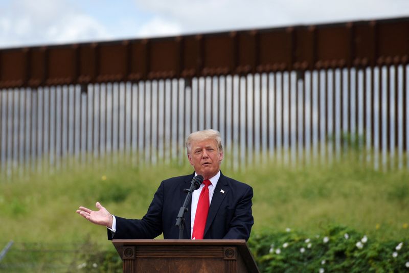 &copy; Reuters. FILE PHOTO: Former U.S. President Donald Trump visits an unfinished section of the wall along the U.S.-Mexico border in Pharr, Texas, June 30, 2021.  REUTERS/Callaghan O'Hare