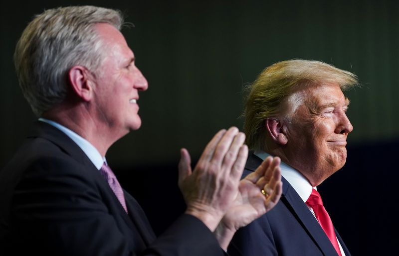 &copy; Reuters. FILE PHOTO: House Republican leader Kevin McCarthy (R-CA) applauds as he and U.S. President Donald Trump take part in an event on water accessibility for farms during a visit to Bakersfield, California, February 19, 2020. REUTERS/Kevin Lamarque