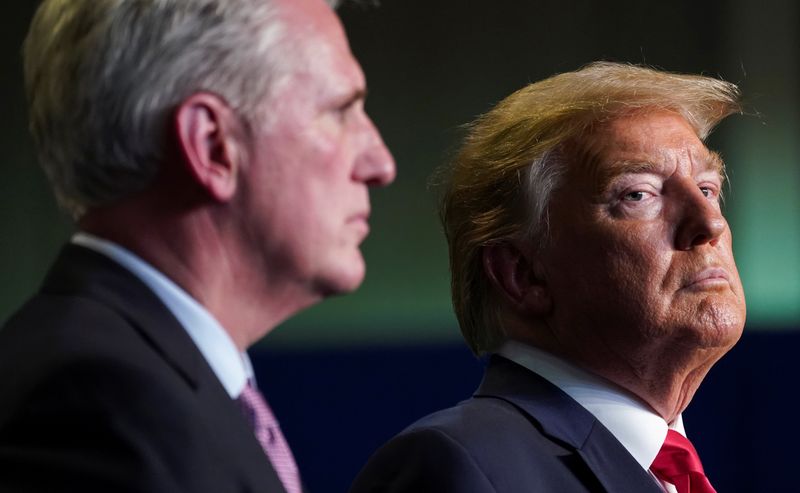 © Reuters. FILE PHOTO: U.S. President Donald Trump looks back toward House Republican leader Kevin McCarthy (R-CA) at an event on water accessibility for farms during a visit to Bakersfield, California, February 19, 2020. REUTERS/Kevin Lamarque