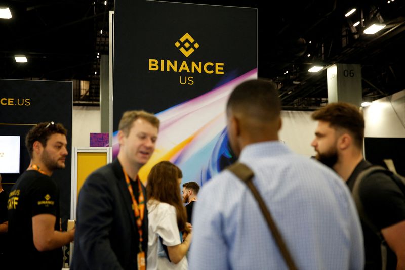 © Reuters. FILE PHOTO: The logo of Binance US is seen at a stand during the Bitcoin Conference 2022 in Miami Beach, Florida, U.S. April 6, 2022. REUTERS/Marco Bello/File Photo