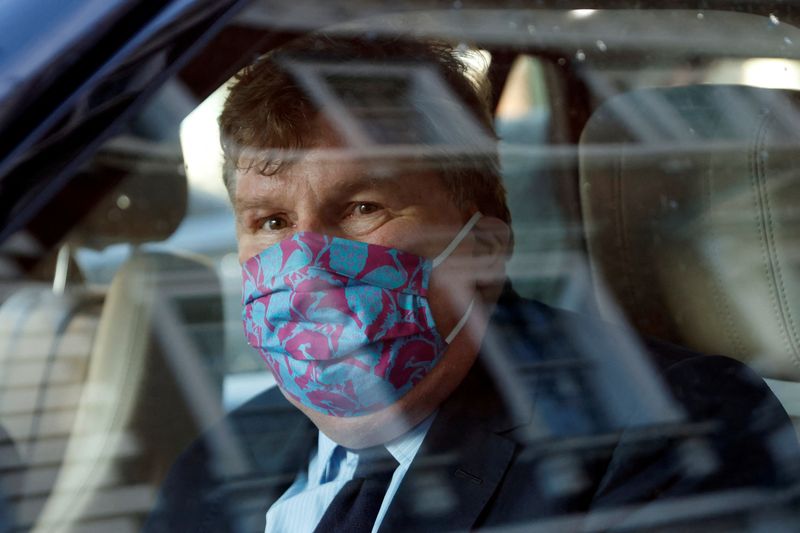 &copy; Reuters. FILE PHOTO: Hedge fund manager Crispin Odey sits in a vehicle departing Westminster Magistrates' Court, after being found not guilty of indecent assault, during a three-day long trial in London, Britain, March 11, 2021. REUTERS/John Sibley/
