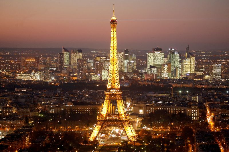 &copy; Reuters. FILE PHOTO: A general view show the illuminated Eiffel Tower and the skyline of La Defense business district (Rear) at night in Paris, France, November 28, 2016. REUTERS/Charles Platiau/File Photo