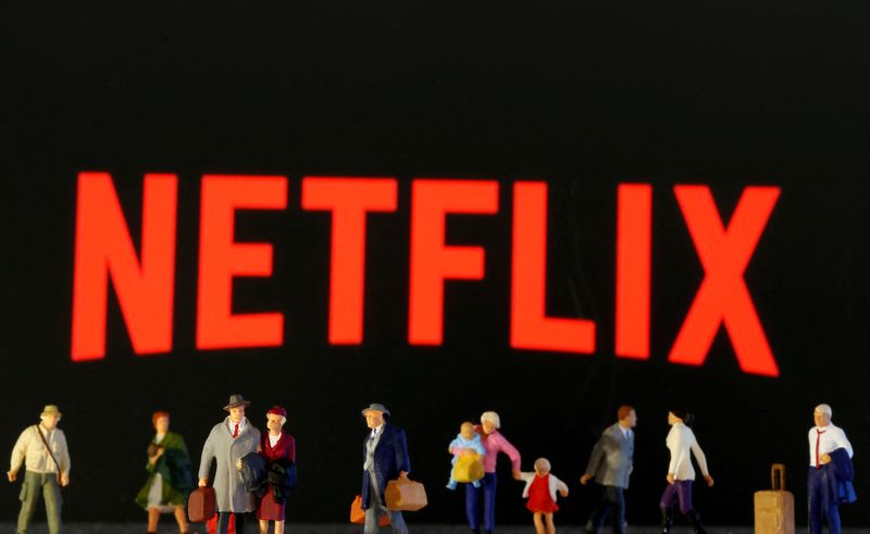 &copy; Reuters. FILE PHOTO: Small toy figures are seen in front of diplayed Netflix logo in this illustration taken March 19, 2020. REUTERS/Dado Ruvic/Illustration/File Photo