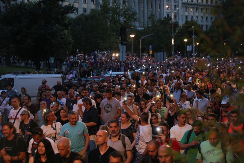 Serbians take to streets in anti-government protests following mass shootings