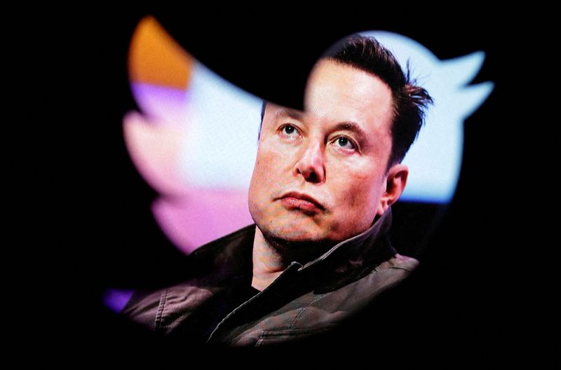 &copy; Reuters. FILE PHOTO: Elon Musk's photo is seen through a Twitter logo in this illustration taken October 28, 2022. REUTERS/Dado Ruvic/Illustration/