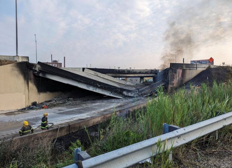 &copy; Reuters. A general view shows the partial collapse of Interstate 95 after a fire underneath an overpass in Philadelphia, Pennsylvania, U.S., June 11, 2023. City of Philadelphia Office of Emergency Management/Handout via REUTERS    