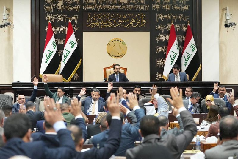 &copy; Reuters. Iraqi lawmakers attend a parliamentary session to vote on the federal budget at the parliament headquarters in Baghdad, Iraq, June 11, 2023. Iraqi Parliament Media Office/Handout via REUTERS